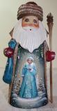 Santa ClausHand carved and painted, wooden Santa Clause with the Snow Maiden 