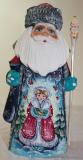 Hand carved and painted, wooden Santa Clause with the Snow Maiden